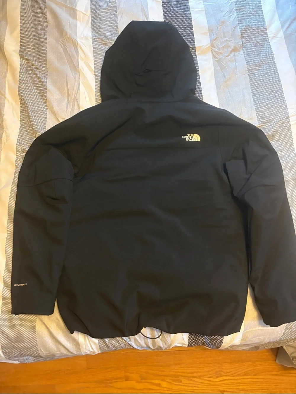 The North Face Black Hooded Jacket men’s medium.